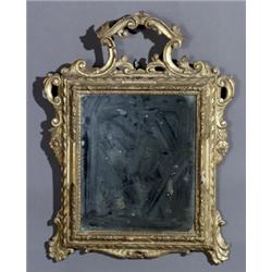 Louis XV Giltwood Small Mirror, Mid-18th Century, Repairs and break to pediment; some corrosi...