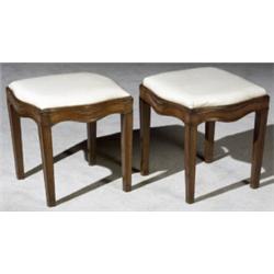 Pair of Louis XVI Walnut Serpentine Stools, Last Quarter 18th Century, Each with white leathe...