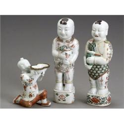 Group of Three Chinese Export 'Famille Verte' Figures of Boys, 19th Century, The kneeling fig...