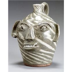 American Stoneware Face Jug, Probably Burlon Craig, Vale, NC, Since 1975, Having a swirled gr...