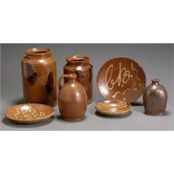 Group of Seven Redware Table Articles, Probably Pennsylvania, Mid-19th Century, Consisting of...