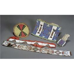 Group of Five Native American Polychrome Beaded Hide Articles, Late 19th-Early 20th Century,...