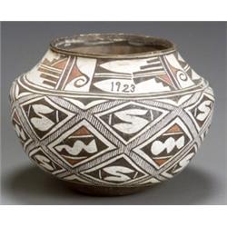 Zuni Polychrome Jar, Signed IP, Dated 1923, Overall decorated with stylized geometric designs...