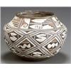 Image 1 : Zuni Polychrome Jar, Signed IP, Dated 1923, Overall decorated with stylized geometric designs...