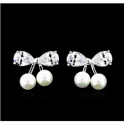 Sea Shell Bow Earrings - Rhodium