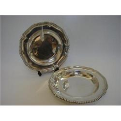 A NEAR PAIR OF SOUP PLATES, shaped circular, gadroon mounts, London 1868 and 1891, (approximate w...