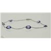 Image 1 : #38- 14KT WHITE GOLD TANZANITE BRACELET