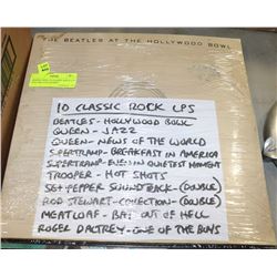 BINDER WITH 10 CLASSIC ROCK LPS INCL BEATLES,QUEEN