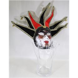 FLAT WITH DECORATIVE WALL MASK AND VASE