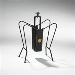 Jacques Adnet magazine rack