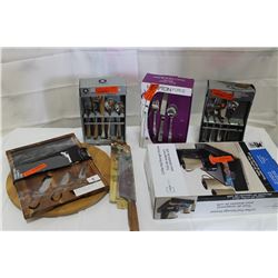 LOT OF CUTLERY SETS AND CUTTING BOARDS ETC
