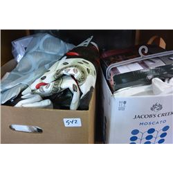 TWO BOXES OF NEW TABLE CLOTHS AND CURTAINS