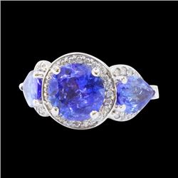 5.6CT NATURAL TANZANITE 14K W/G RING