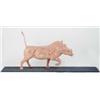 Image 1 : David Sykes: a carved wood warthog, in laminated alternating coloured woods, 16 by 22 ins. on sto...