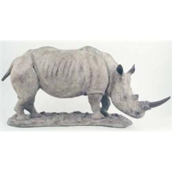 Ian Rank-Broadley: a bronze white Rhino, standing on a naturalistic base signed with a monogram a...