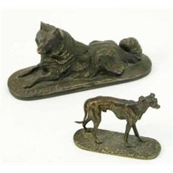 After Emmanuel Fremiet, French early 20th century, A bronze dog, reclining with head raised on ov...