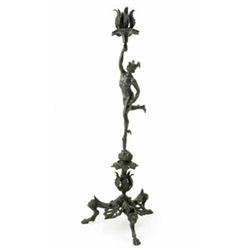 A late 19th century bronze figural candlestick lamp cast as Mercury, the God balanced on classica...