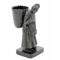A German late 19th century cast-iron figure, the old lady with a basket on her back acting as a s...