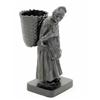 Image 1 : A German late 19th century cast-iron figure, the old lady with a basket on her back acting as a s...