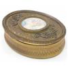 Image 1 : A French early 20th century gilt metal oval box, the cover set with a portrait miniature of a gir...