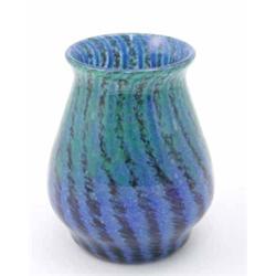 A Monart glass baluster vase, mottled in blues and greens in a striped design, label missing, 7in...