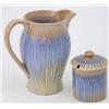 Image 1 : A Shelley baluster jug, and matching pot with cover, with streaked glaze-effects in brown, blue a...