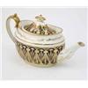 Image 1 : An early 19th century bone china teapot, of oval shape, gilded against a royal blue ground, finia...