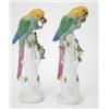 Image 1 : A pair of German porcelain parrot models, perched on tree stumps, (some damage) 12.5ins...