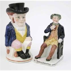 A Victorian earthenware character jug, with top hat cover, 10.5ins and a similar figure of a seat...