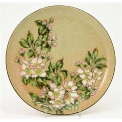 A Linthorpe saucer dish, designed by Henry Tooth, painted with pink flowers and green leaves agai...