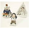Image 1 : Three Victorian Staffordshire pottery models, a spill vase figure group, 6.5ins, dignitary on cou...