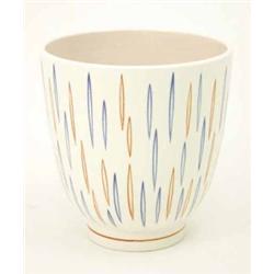 A Poole pottery jardiniere, painted with diamond devices in blue and red, pattern X/PV, 7.5ins hi...