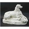 Image 1 : A Victorian parian model of a dog, lying facing forward, (neck repaired) 13.5ins...
