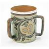 Image 1 : A Doulton Lambeth stoneware tyg, designed by Eliza Simmance, decorated with a sgraffito foliate b...