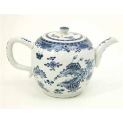 A Chinese blue and white globular teapot, decorated with butterflies and flowers...