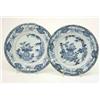 Image 1 : A set of 13 Chien Lung blue and white export plates, decorated with flowers in a vase, rocks and...