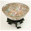 Image 1 : A 19th century Cantonese punch bowl, decorated with panels of figures on terraces, (chipped) 14.5...
