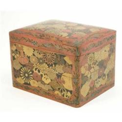 A Meiji lacquer rectangular box, of two divisions painted with gold and red flowers on a red grou...