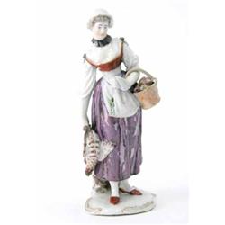 A Ludwigsburg figure of a farmer's wife with a basket and apron of fruit and vegetables and a chi...