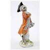 Image 1 : A Meissen figure of a soloist from the monkey band, modelled by J.J. Kaendler holding a sheet of...