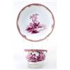 Image 1 : A Meissen teacup and saucer painted en camaieu rose with a hound guarding dead game and two deer...
