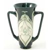 Image 1 : A Moorcroft Collectors Club Snowdrop pattern loving cup, 1994 5.75in....