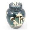 Image 1 : A Moorcroft 'Fairy Rings' ginger jar and cover, a design of toadstools against a dark green groun...