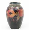 Image 1 : A Moorcroft pomegranate vase, of ovoid form with collar rim, circa 1920, decorated with an encirc...