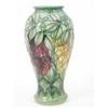 Image 1 : A Moorcroft Rain Forest baluster vase, early 1990's, designed by Sally Tuffin, decorated with var...