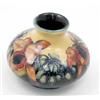 Image 1 : A Moorcroft frilled orchid squat vase, circa 1940, decorated in shades of red, blue and green aga...