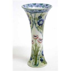 A Moorcroft trumpet vase, circa 1908-1909, decorated with poppies and contained panels of forget-...