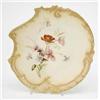 Image 1 : A Royal Worcester plate, of asymmetric shape pierced with diaper bands, moulded with c-scrolls an...