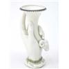 Image 1 : A Royal Worcester 'hand' vase, the hand holding a tapering vase with ram's head terminal, date co...