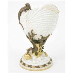 A Royal Worcester nautilus vase, with lizard surmount, supported upon a branch and gilt shells, o...